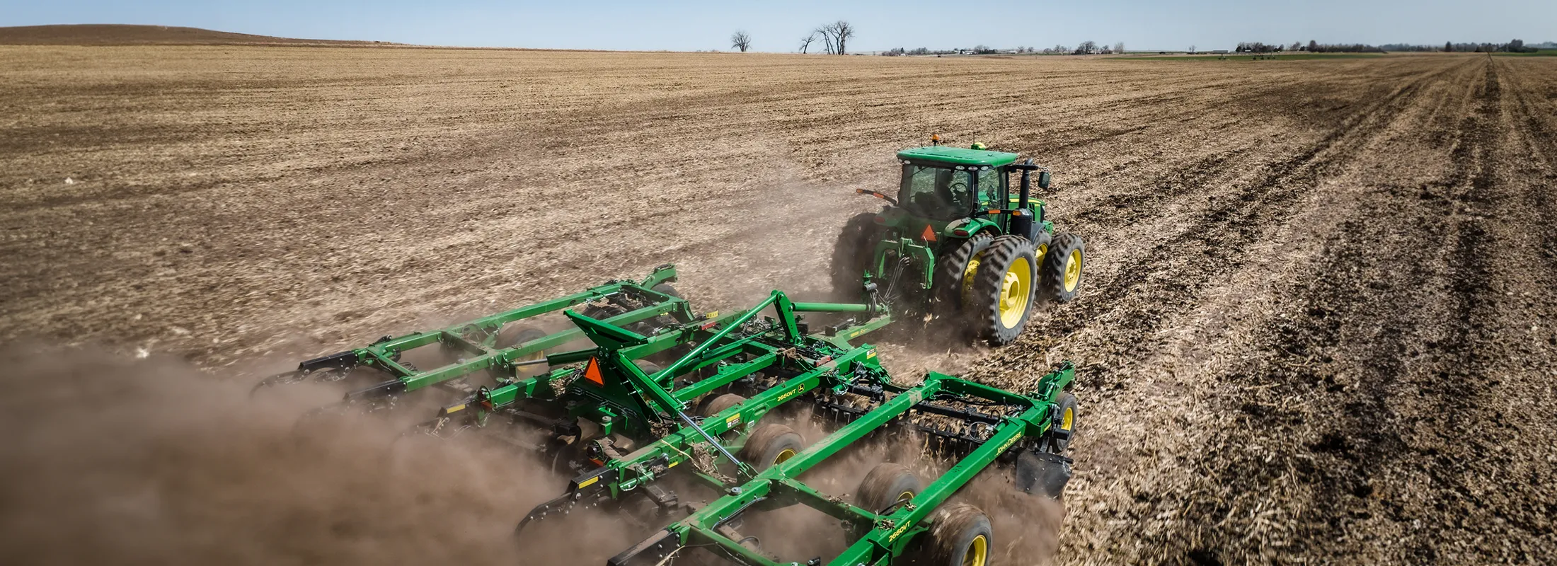tractor rolling in a field