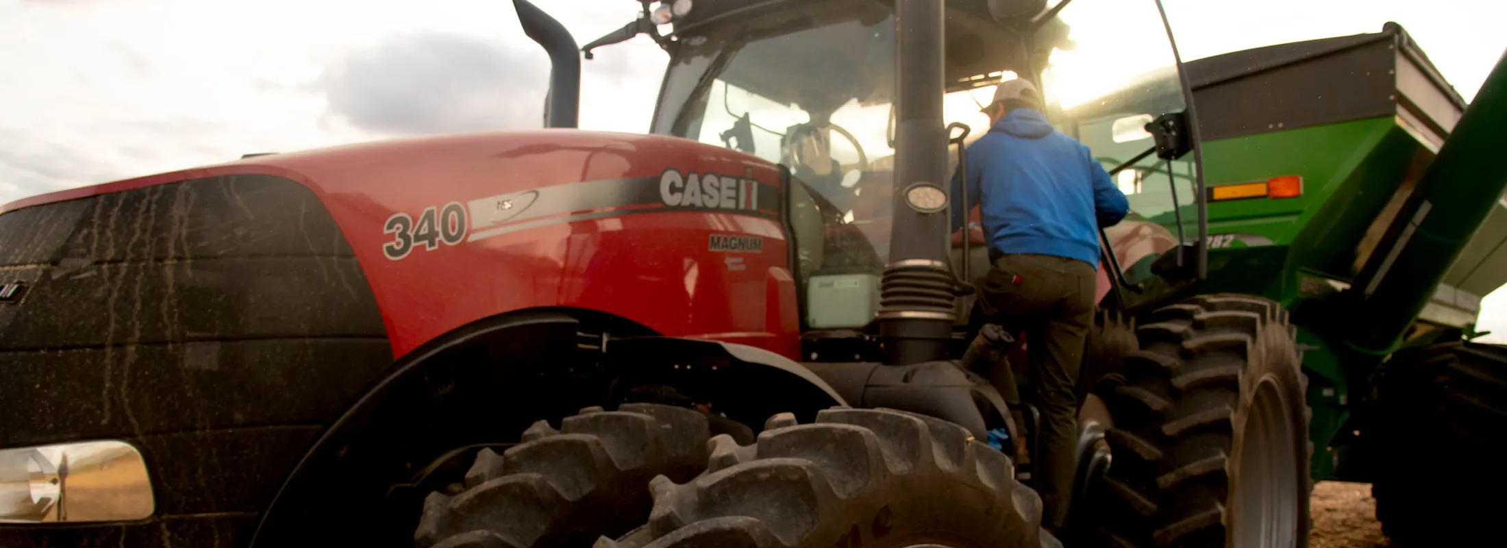 a person getting into a tractor