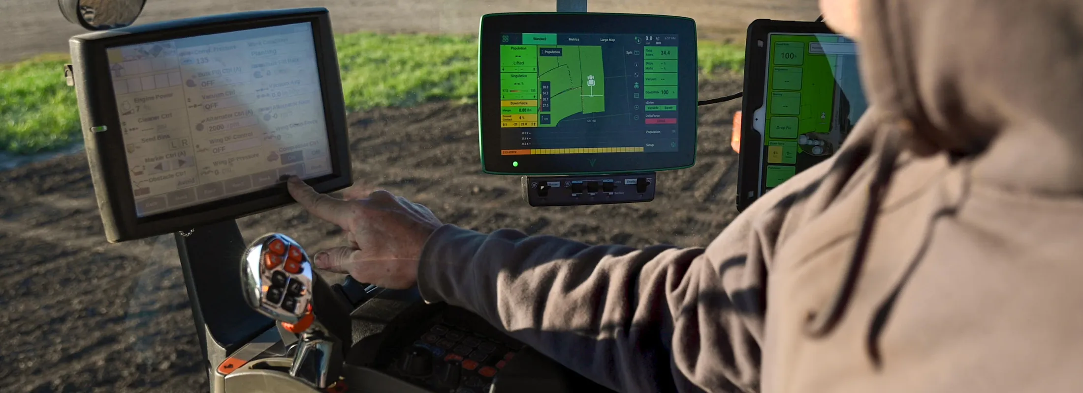 a person pressing a button on equipment controls