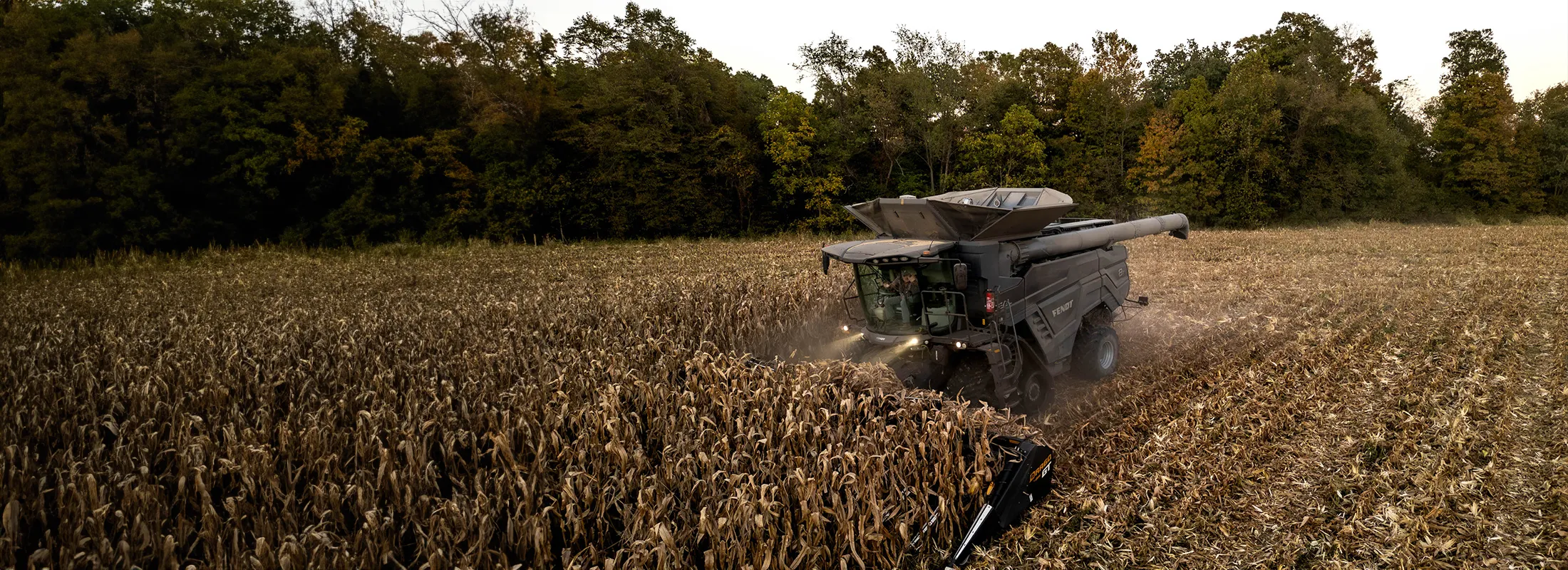 a combine harvester operating in a field