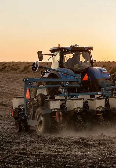 blue tractor in field